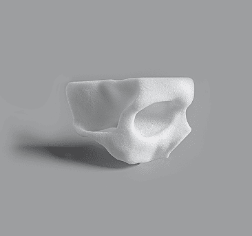 White complex orbital implant with multiple anatomical features