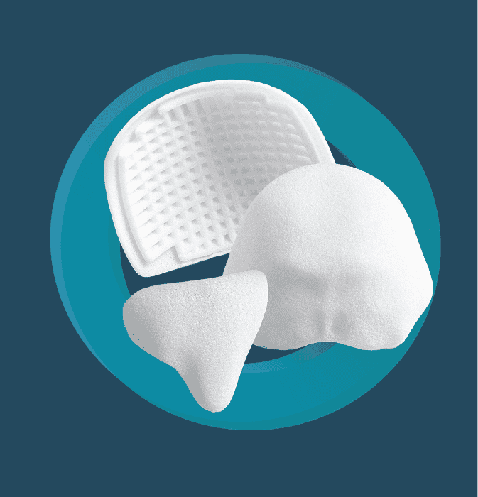 Cranial Implants Porous Polyethylene Product Range SU-POR Solutions Various white cranial implant shapes showing curved and flat configurations for skull reconstruction