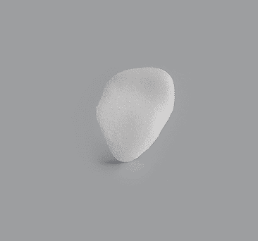 Curved white wedge-shaped implant for orbital floor support