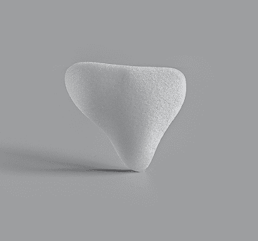 Curved wedge-shaped white implant for mastoid bone reconstruction