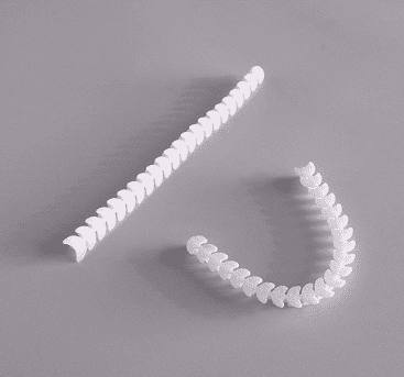 Curved white strip implant for filling surgical gaps