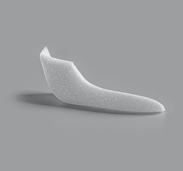 White curved elongated implant for mandibular ramus augmentation