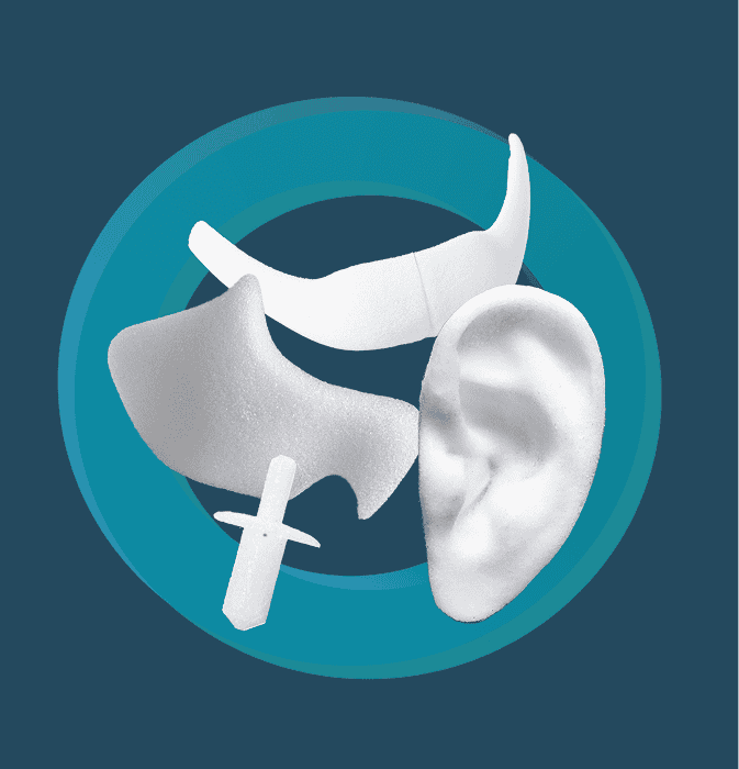 Facial Implants Porous Polyethylene Product Range Maxillofacial Reconstruction Various white facial implant shapes including jaw, cheek and ear components arranged in circle