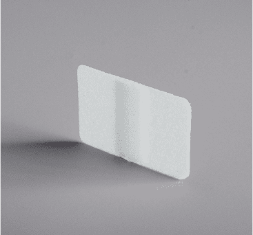 White flat rectangular implant with single central channel