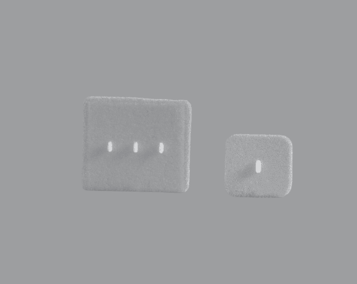 Sellar Floor Cranial Implants Porous Polyethylene Rectangular white implants with drainage holes for skull base reconstruction